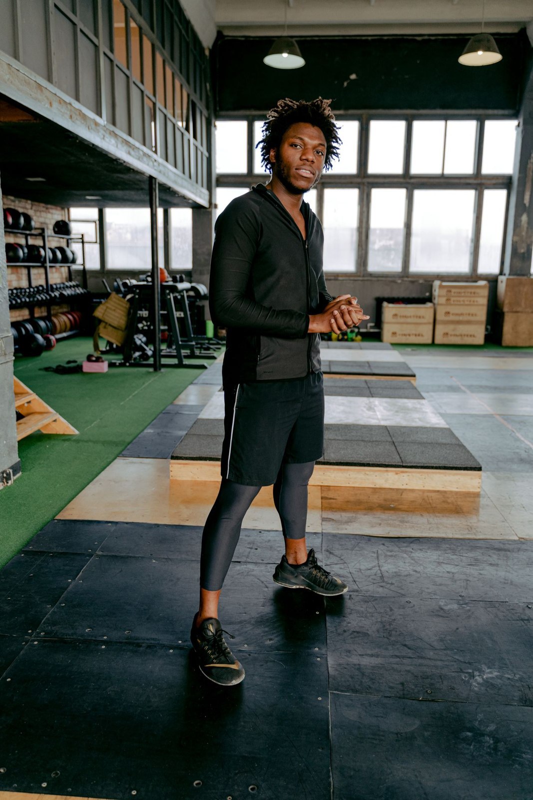 A simple dark training outfit in a gym