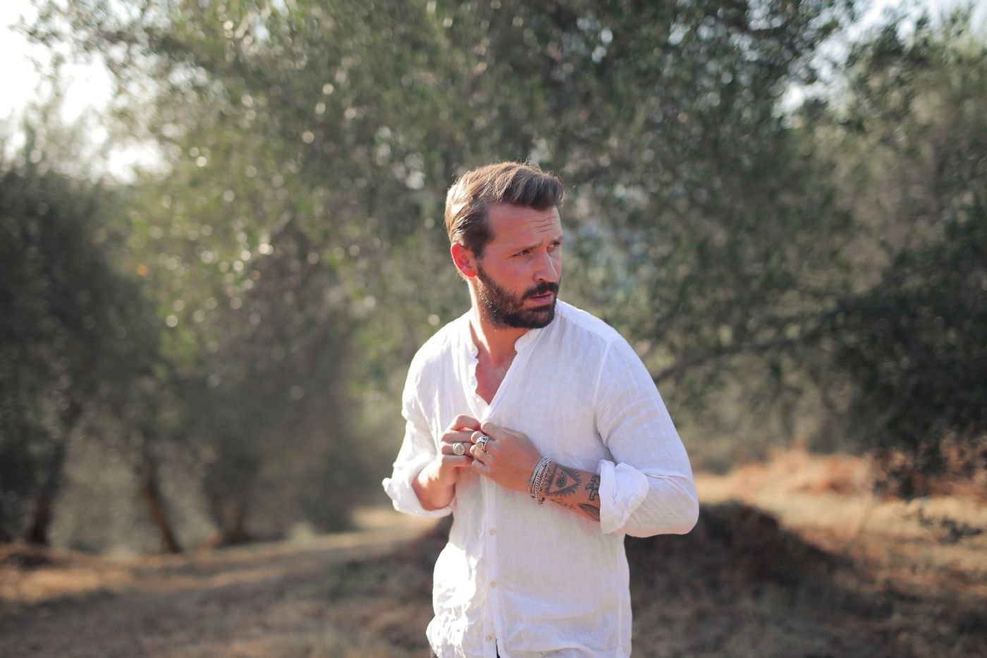 An open-neck white shirt outdoors