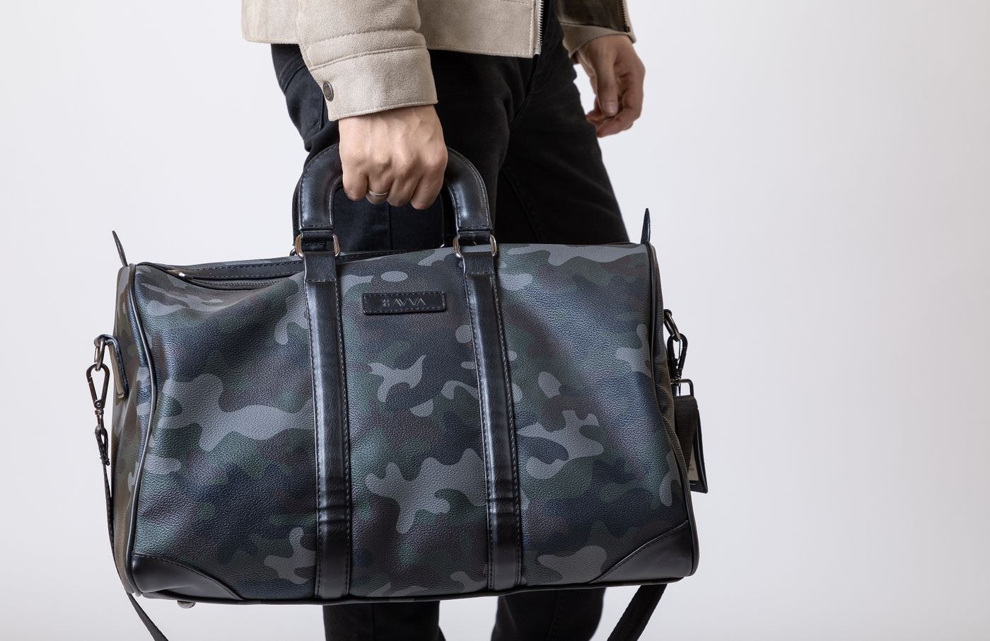 A structured leather weekender bag