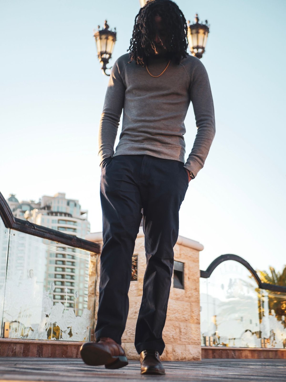 A grey knit with dark jeans