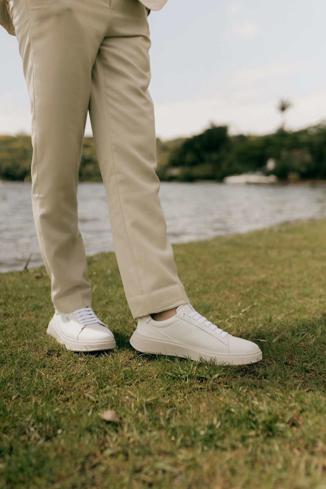 Stone-coloured chinos with white trainers