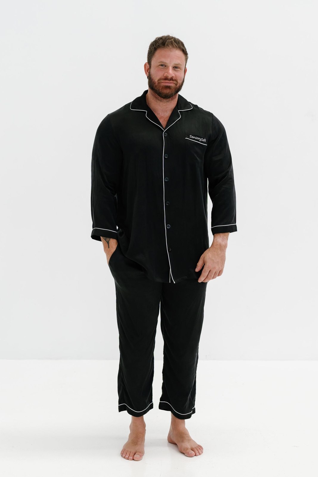 Loose dark lounge trousers with a matching top
