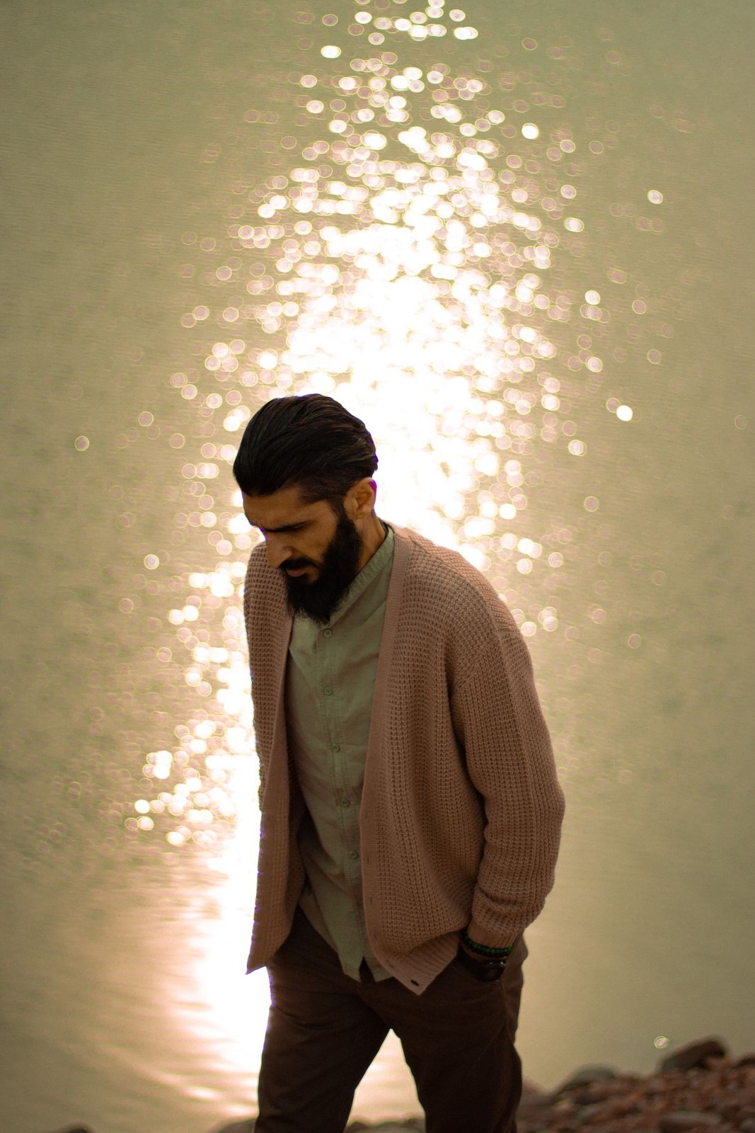 A cardigan worn over a casual shirt