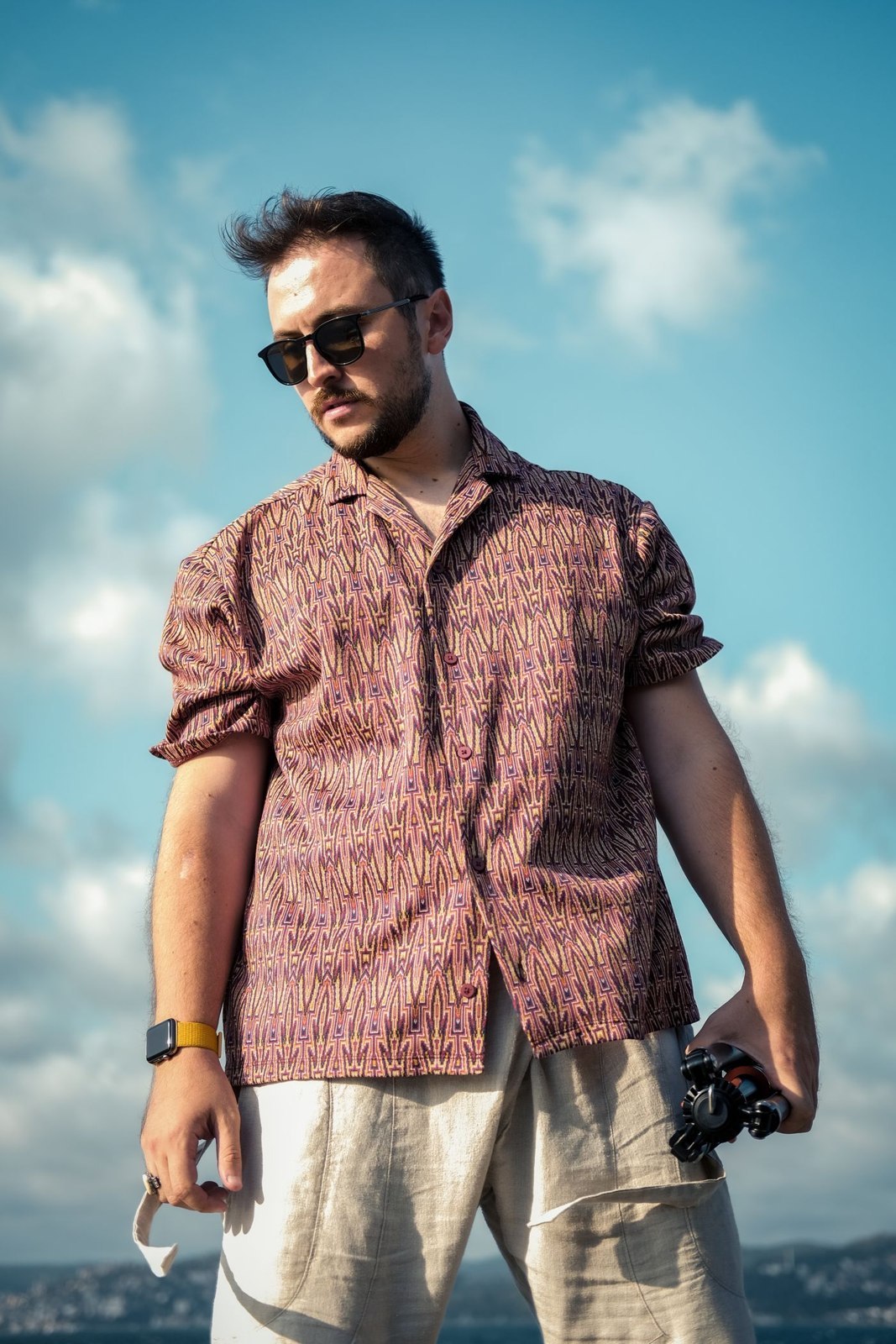 Light linen trousers with a short-sleeved shirt