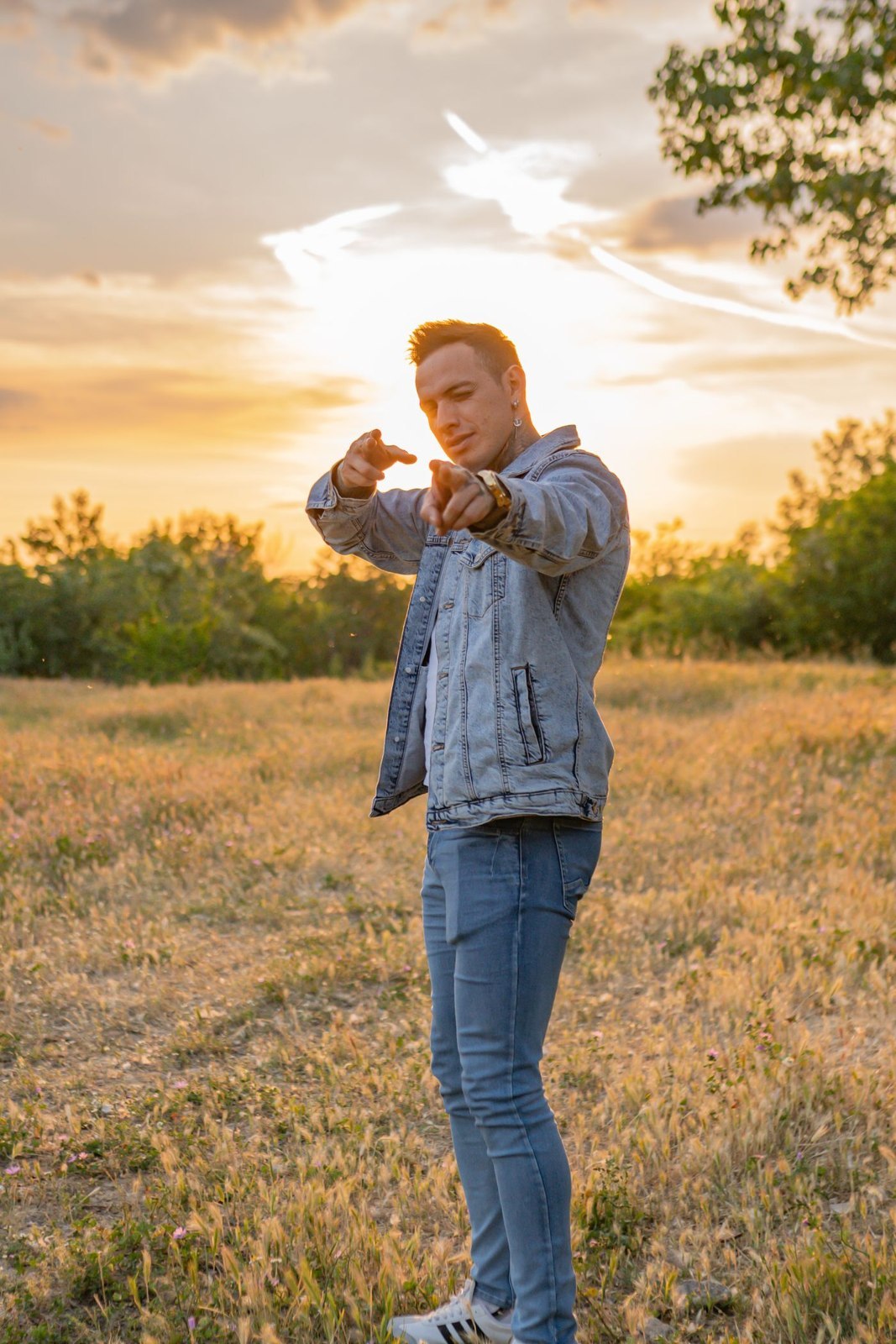 A blue denim jacket and blue jeans