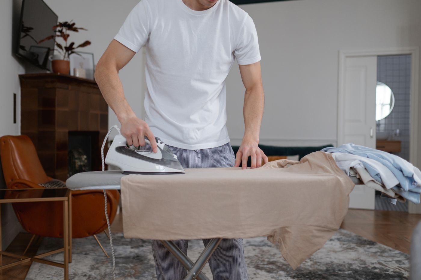 A shirt being ironed before use