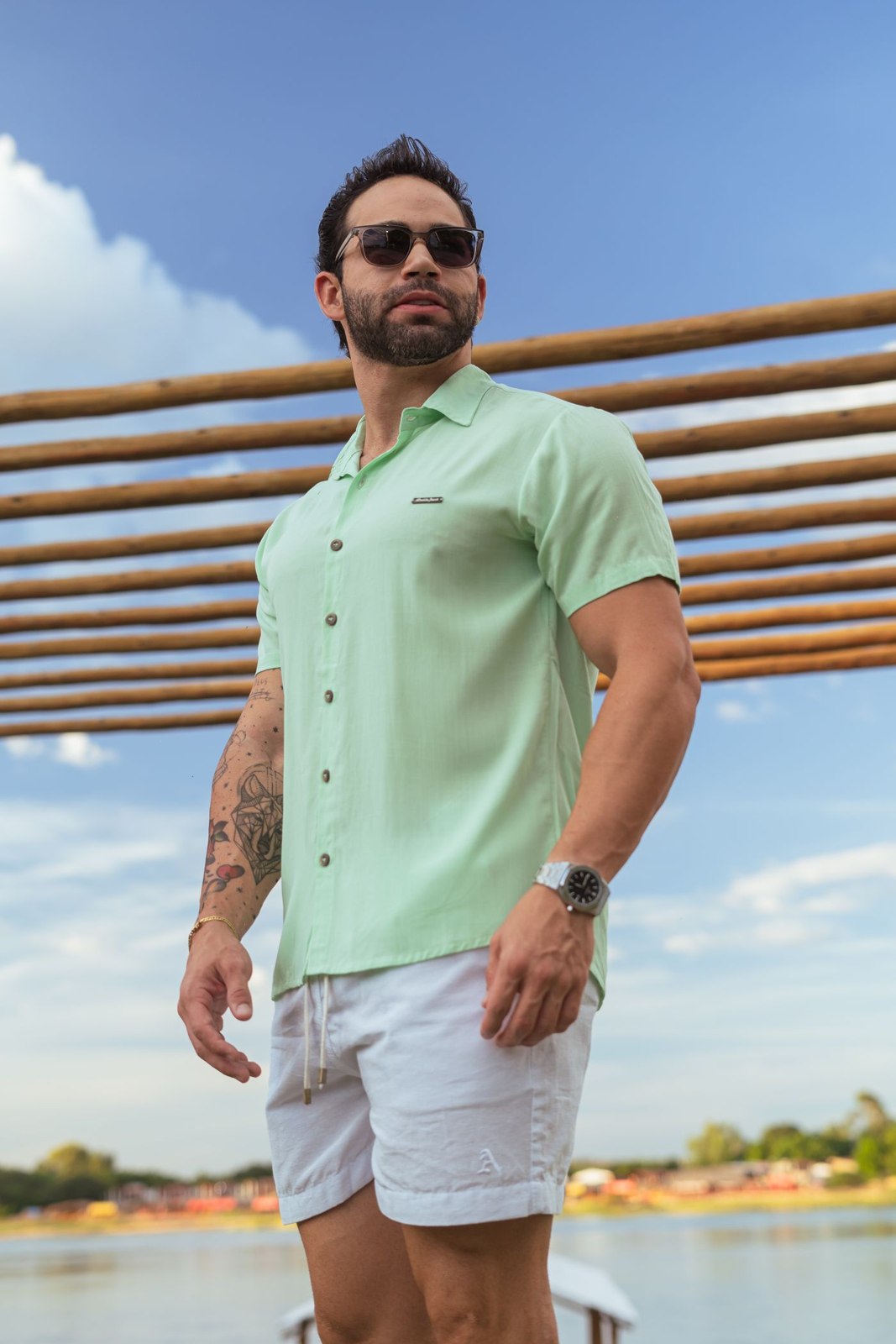 A short-sleeved shirt with neat summer shorts