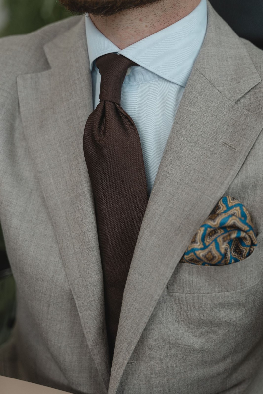 A shirt collar worn with a tie