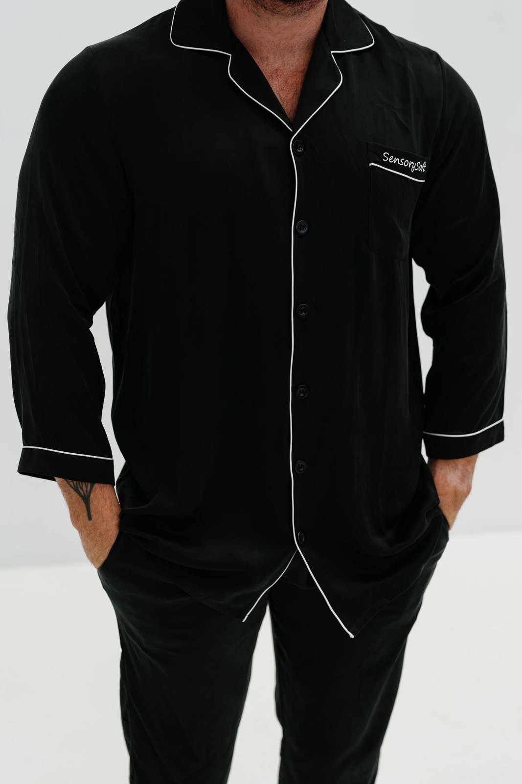 A dark pyjama shirt with contrast piping