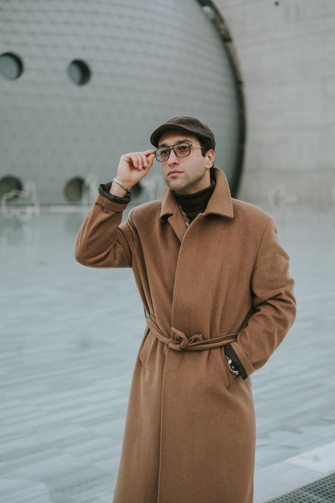 A long wool coat with a belt