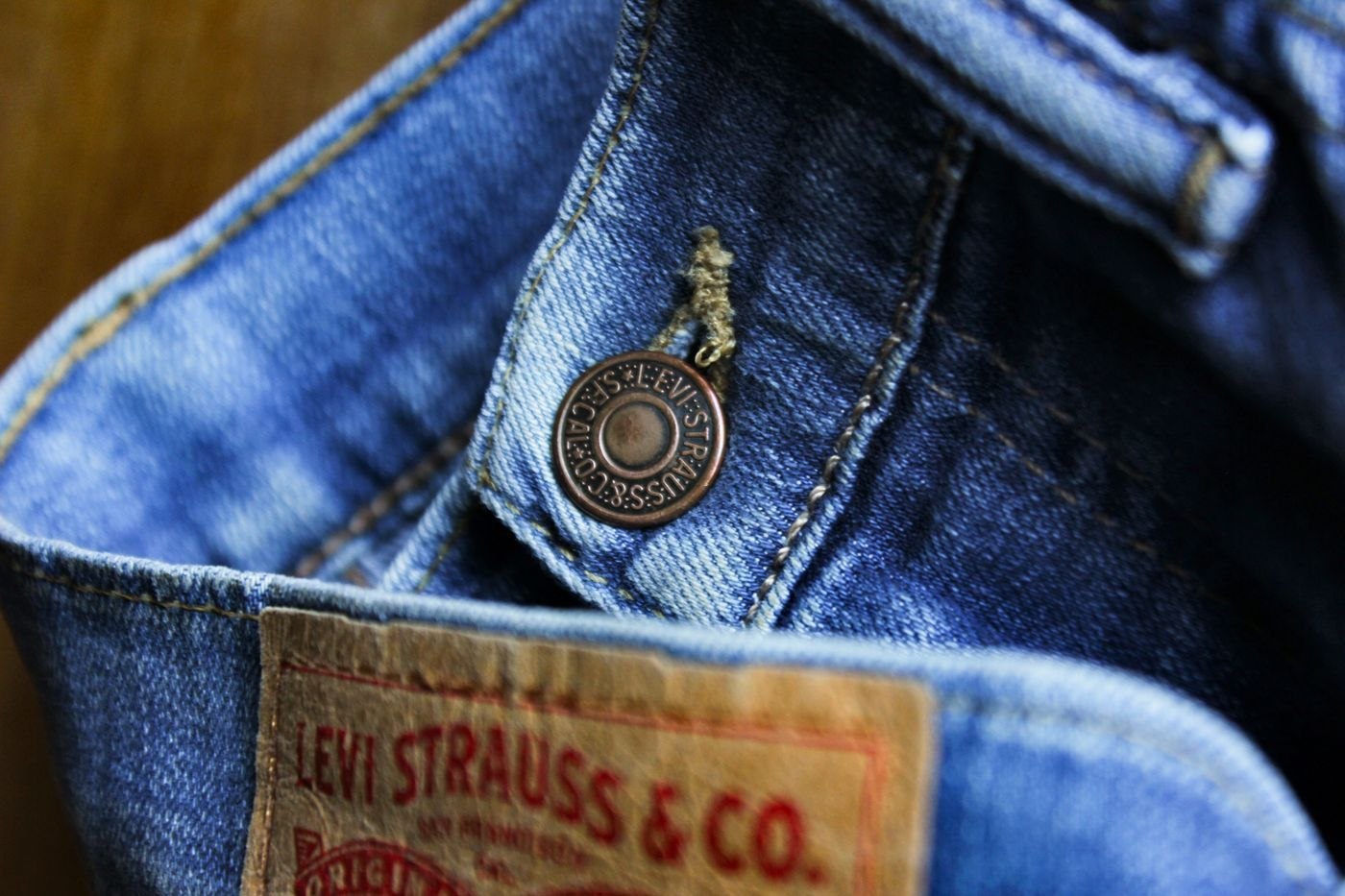 Close view of denim at a jeans waistband