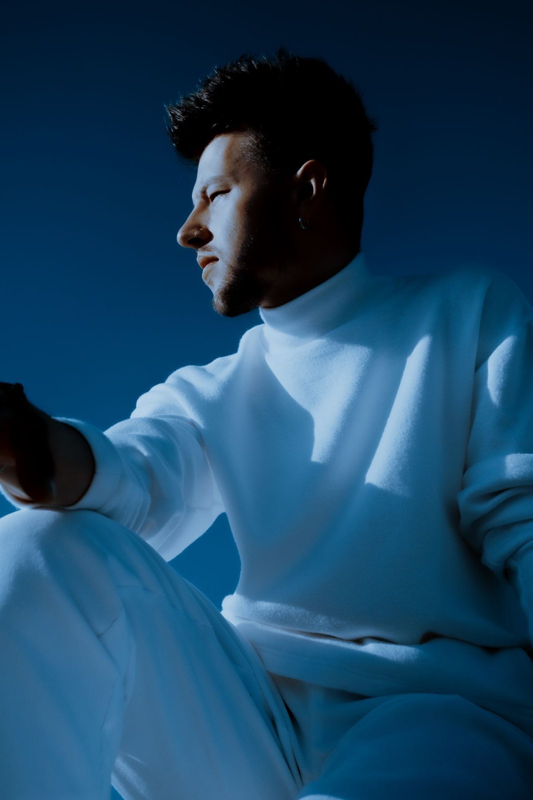 A light roll-neck worn as a close-fitting layer