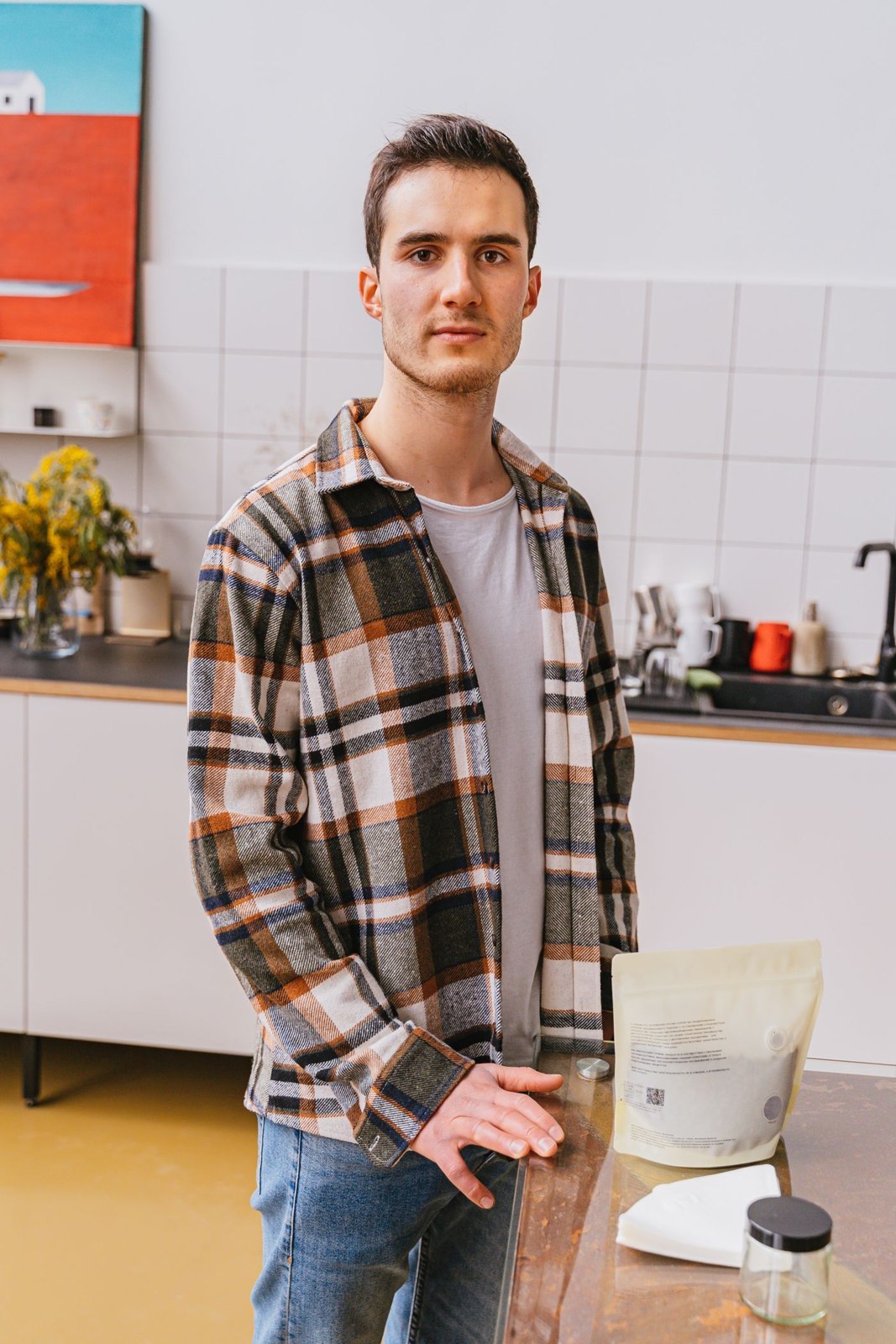A checked overshirt worn open