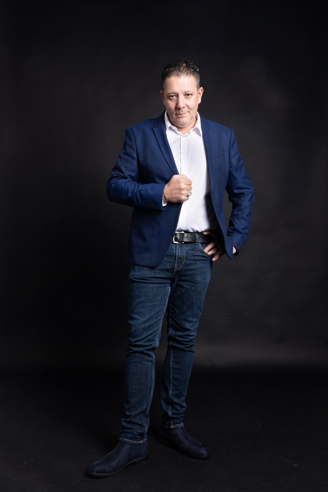 A navy jacket with its full length visible