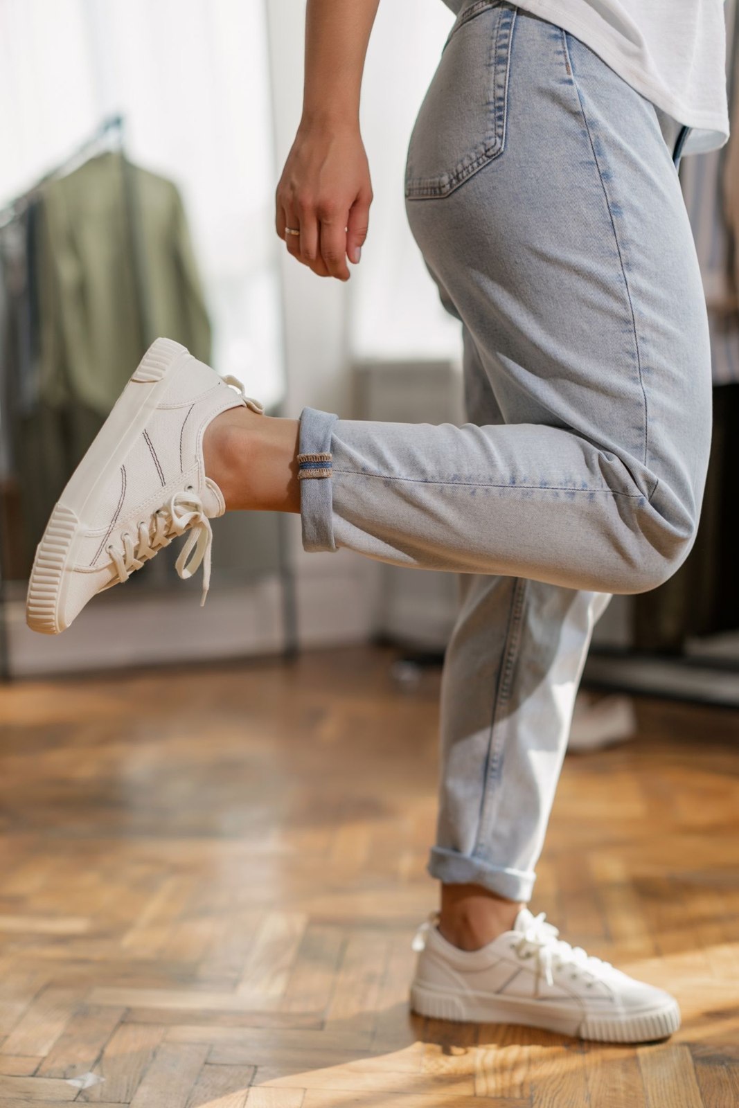 White trainers with pale tailored trousers