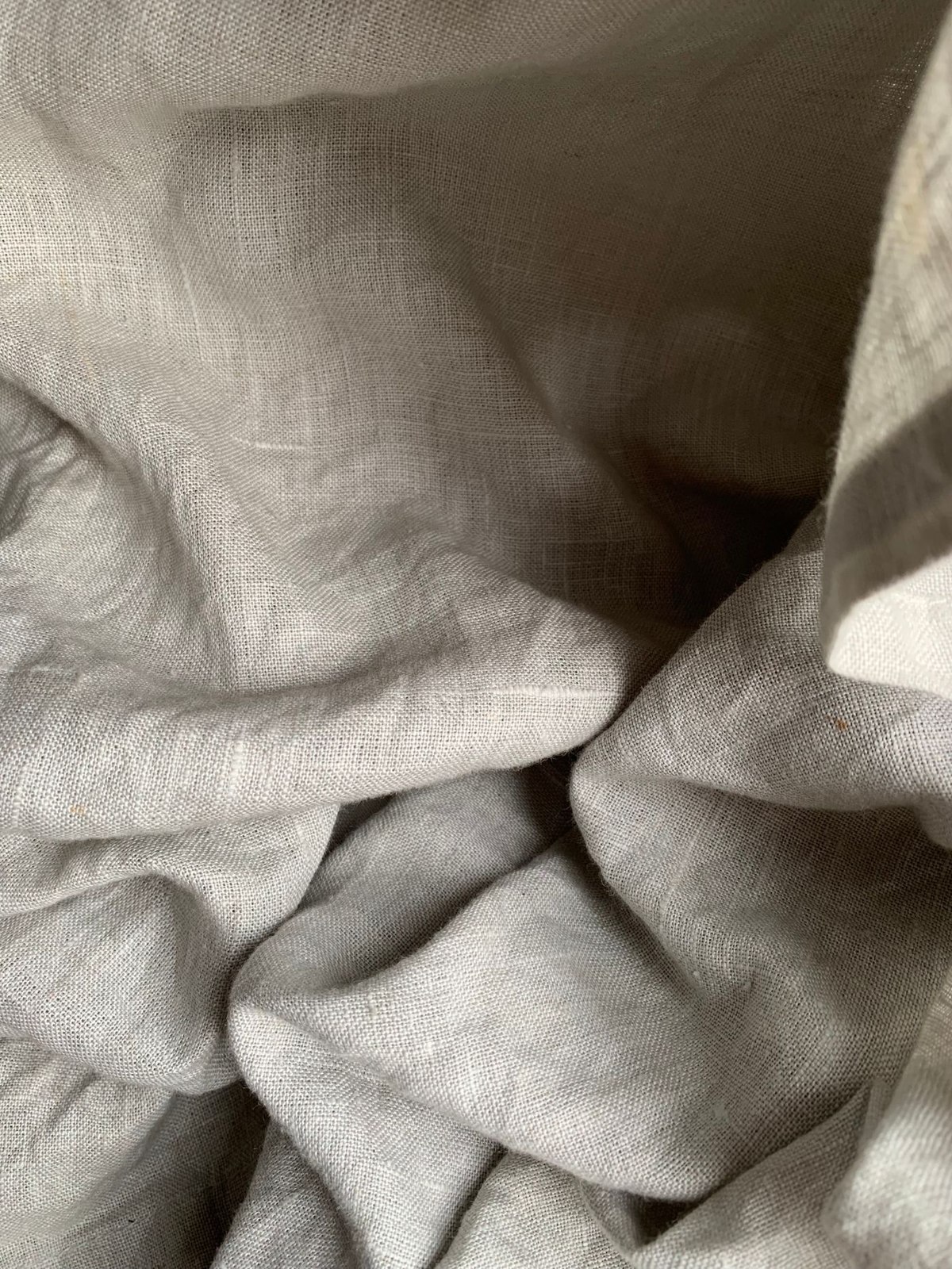 Creases in pale linen cloth